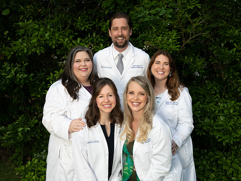 Class of 2024 outdoor group portrait featuring Brigitte Davis, Neil Huben, Shelby Liddell, Kathryn Palmer and Logan Roka.